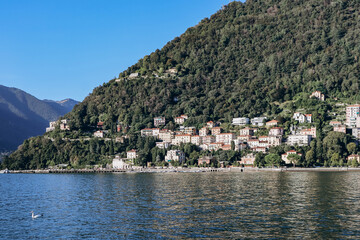 Fototapeta na wymiar Como, Italy - August 8, 2023: View of the town of Como in Italy on the lake of the same name