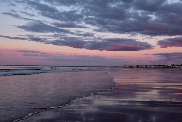 Beautiful colorful seascape at sunrise. Calm expanse of the sea. Coast of the Atlantic Ocean. USA. Maine
