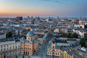 Obraz premium Beautiful scenery of Lodz city center with Piotrkowska street at dawn, Poland