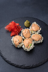 Delicious rolls on a dark background. Japanese cuisine. Close up  