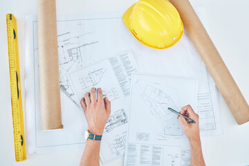 Hands, above and a blueprint on a table for architecture, construction design or planning. Creative, logistics sketch and a contractor or builder with a drawing for infrastructure idea on paper