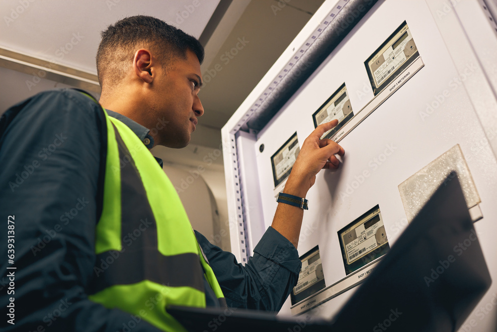 Poster man, maintenance and control room with laptop, electrician with inspection and fixing electricity su