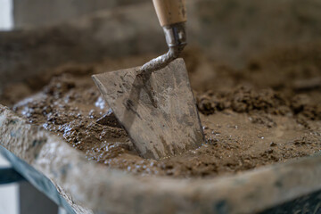 pelle spatule maçonnerie construction maison