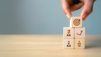 Business strategy concept with wooden blocks with icons.