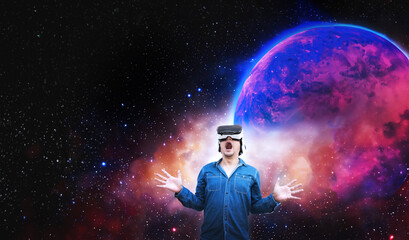 Naklejka premium asian man shocking in open space with virtual reality to see galaxy
