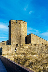 Huesca, Spain-August 20, 2023. Aínsa, Pyrenean village in the province of Huesca, Sobrarbe and the Autonomous Community of Aragon, Spain. Collegiate Church of Santa Maria, Romanesque