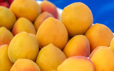 Fresh apricots on the counter in the market