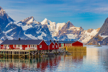 red houses in the fjord of hamnoy lofoten norway in winter
