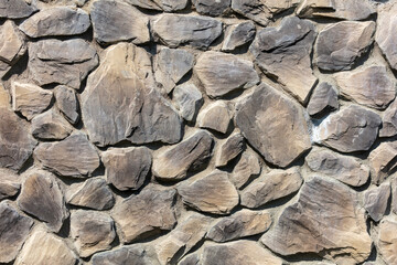 On from stone bricks as an abstract background. Texture