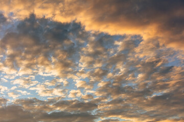 Colorful clouds at sunset as background