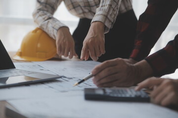 Engineer Teamwork Meeting, Drawing working on blueprint meeting for project working with partner on...