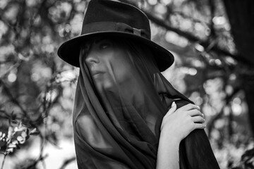 Woman in black, grief dark mood, melancholy and depression concept, lady cover black cloth