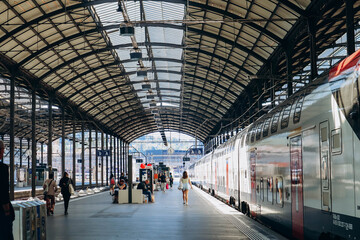 Lucerne, Switzerland - August 10, 2023: Platform at Lucerne Central Railway Station, Switzerland - Powered by Adobe