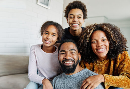child family mother portrait father woman happy daughter son man girl female black american african  love together boy fun parent teen teenager