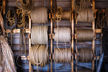 Rolls of rope of various thicknesses.