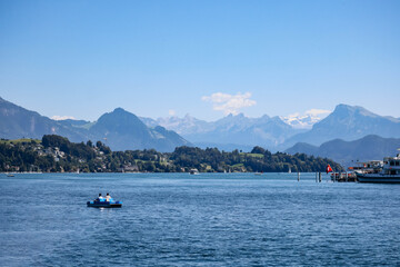Fototapeta na wymiar View of the Lake Lucerne (Lake of the four forested settlements) and the Alps in the background
