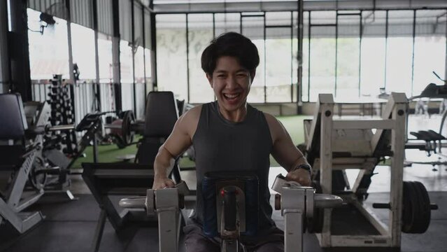 Pec Deck Fly Machine, Men exercise to increase chest muscles, Building Forearm Strength, Bodybuilders Intense Gym Workout with Weight Machine.