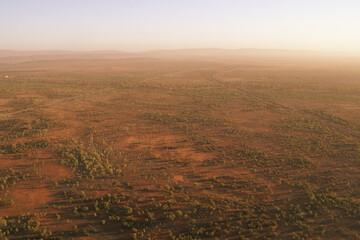 Aerial view of the Australian outback in the morning mist, Red Centre, Northern Territory, Australia