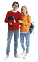 Teenage couple with books on white background