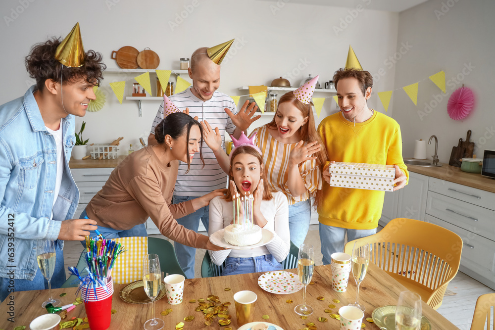 Sticker Young woman bringing Birthday cake to her friend at party