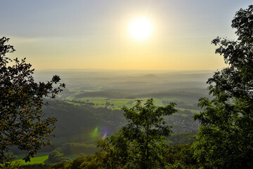 the landscape of the röhn in germany in the evening