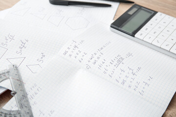 Naklejka na ściany i meble Open copybooks with math formulas as background, closeup