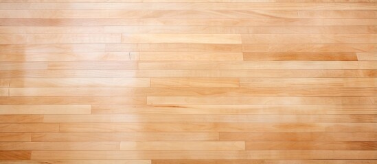Maple hardwood basketball court seen from above