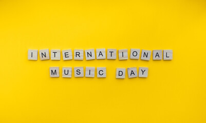 October 1, International Music Day, minimalistic banner with the inscription in wooden letters