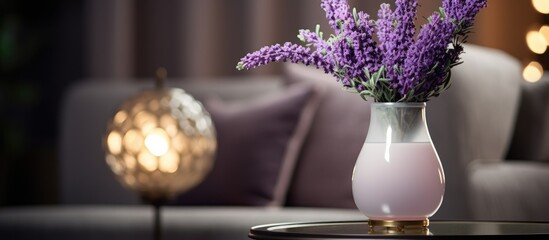 Interior design inspiration Lavender flowers in a vase beside a lamp for floral decor photography