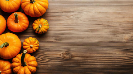 top view of pumpkins on a wooden table, autumn concept