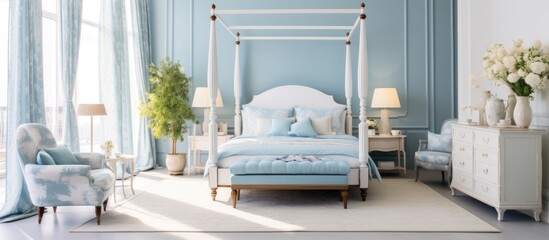 soft colored bedroom with a large four poster bed double bed blue armchair and white furniture