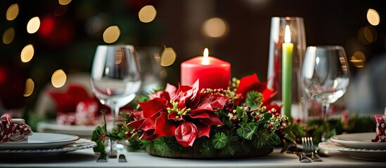 Obraz na płótnie Canvas Closeup of mistletoe wreath on Christmas dining table