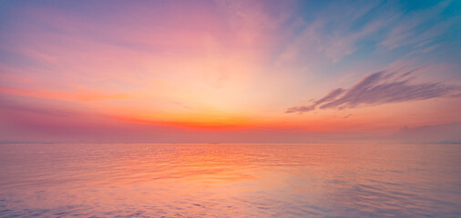 Fototapeta na wymiar Inspirational calm sea with sunset clouds sky. Meditation ocean and sky background. Colorful horizon over the water. Relaxing seascape skyscape sun rays. Panoramic nature horizon dream fantasy ecology