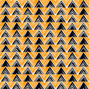 Ethnic seamless pattern. Freehand zigzag stripes print. Boho chic design background. Tribal wallpaper. Brush wavy lines. Handdrawn geometric ornament. Chevron backdrop. Indigenous image. Vector art.