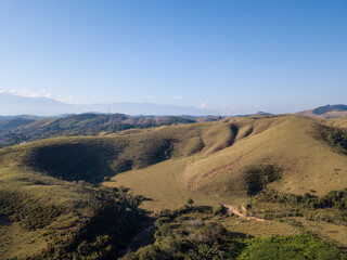 Beautiful aerial view from drone landscape of mountains in Serra da Bocaina in sunny summer day. Sao Paulo, Brazil. Concept of travel, tourism, nature.