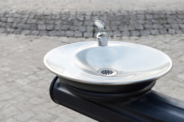 Street tap with drinking water for people and animals.