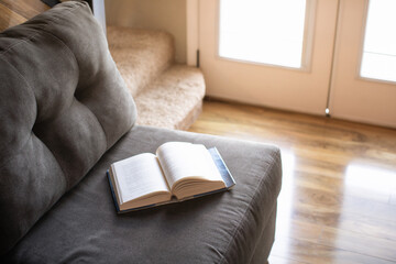 Book on sofa, relax and read