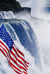 American USA Flag in front of the Niagara Falls