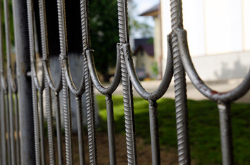 Metal fence close view background. Metallic grid photo
