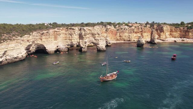 Drone flight over Praia da Marinha, one of the most emblematic beaches in Portugal