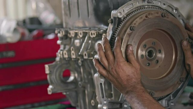 Fitting and Checking the Flywheel Gear of the Car Engine Footage.