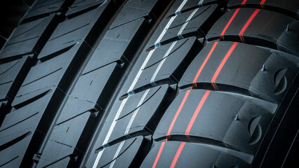 Close-up of grooves tire tread for safety and car grip. Workshops advertisement brochure.