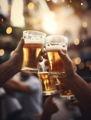 Poster Hand holding glass of beer, brewery, people cheering, cheers, spending a moment together with friends, party, happy moment, nightclub, restaurant, cheering, family © Ncorp