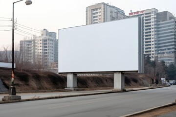 For promotion, a large white blank outdoor billboard is used. Generative AI