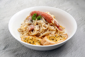 Freshly cooked Pasta with assorted toppings served with garlic bread