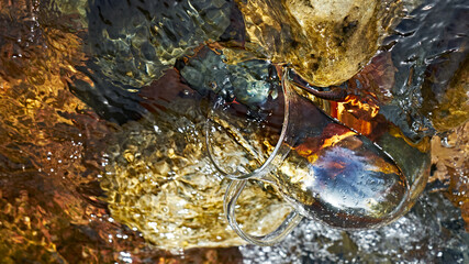 Cool clear water of the mountain river.
