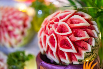 Fruits are trimmed and shaped in a presentation. Art pruning fruit for decoration food, party,...