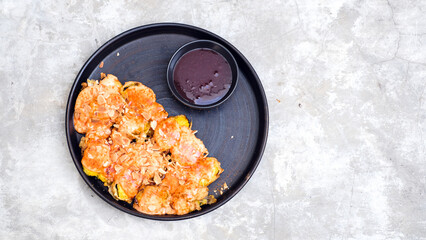 Banana fritter with cheese and almonds