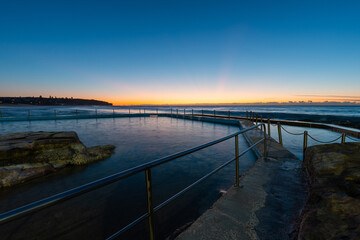 Beautiful sunrise view of Curl Curl rock pool, Sydney, Australia.