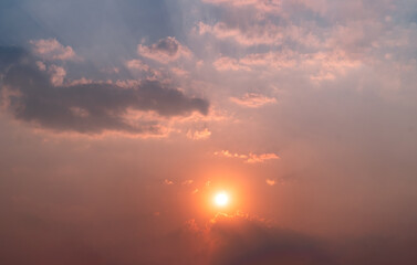The vast Beautiful sky and four orange clouds that are beautiful sky before sunset. The natural sky before background has a breeze on a bright day in the summer.